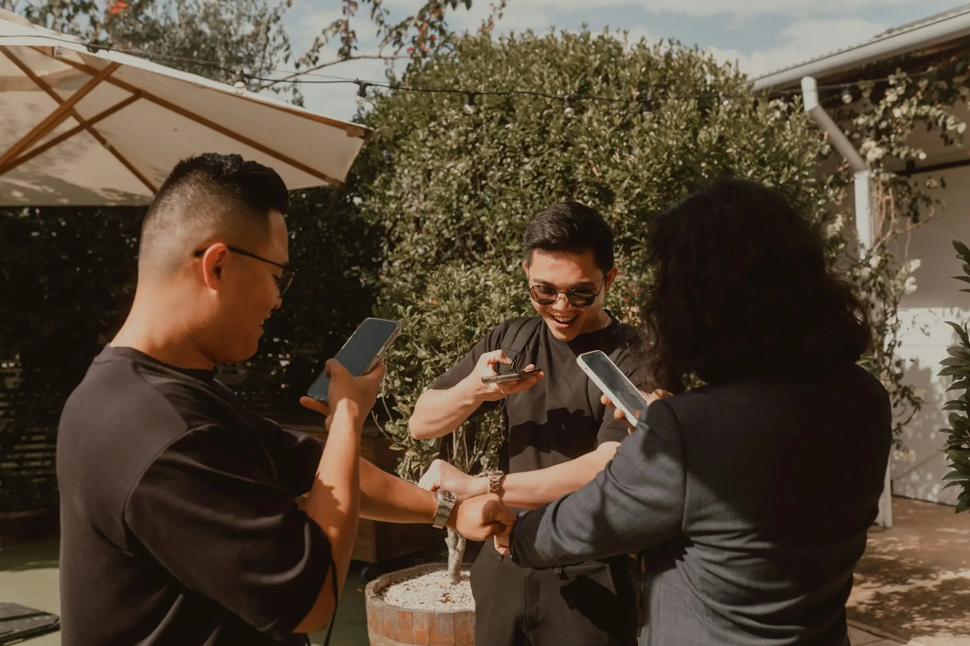 Business owners checking paperwork together outside their Gold Coast workshop